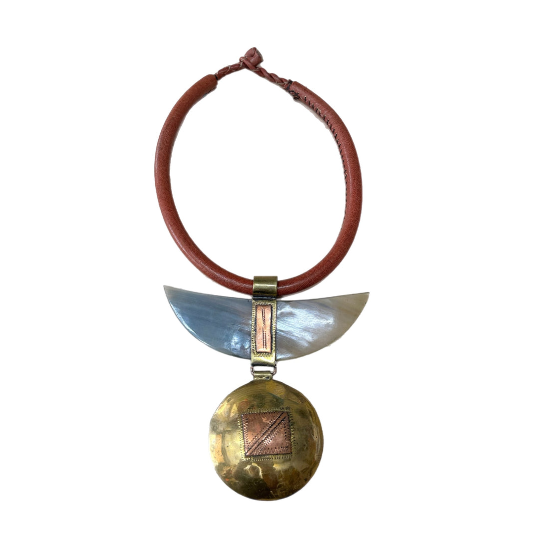 LEATHER WITH BONE AND BRASS